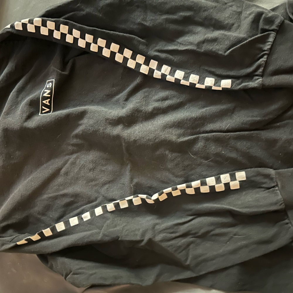 Vans black long sleeve with checkered sleeves.